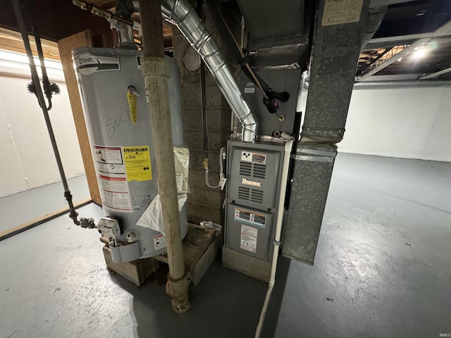 utility room featuring gas water heater