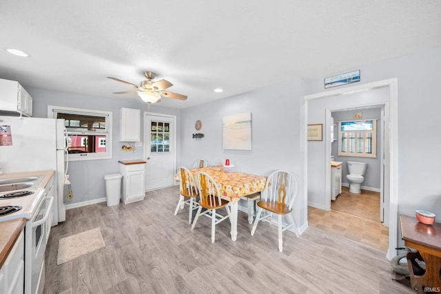 dining space with recessed lighting, light wood-type flooring, baseboards, and a ceiling fan