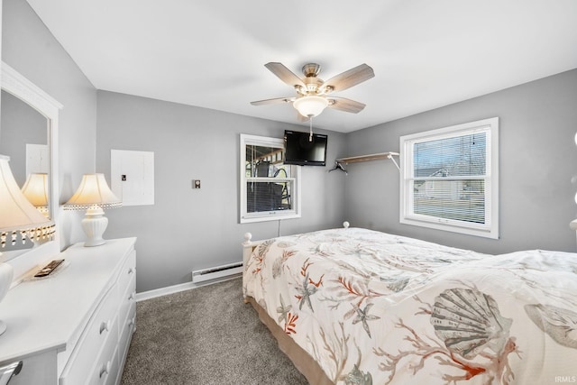 bedroom featuring multiple windows, ceiling fan, carpet, and a baseboard radiator