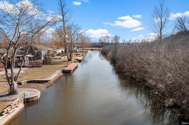 property view of water with a dock