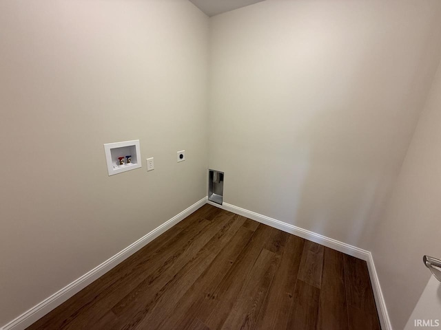 clothes washing area featuring baseboards, washer hookup, laundry area, electric dryer hookup, and dark wood-style flooring