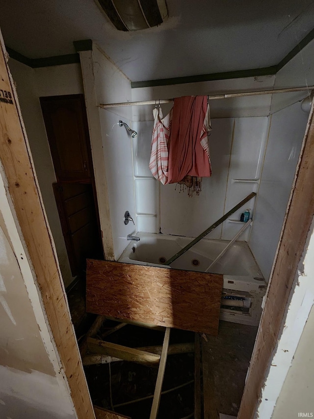 bathroom featuring washtub / shower combination