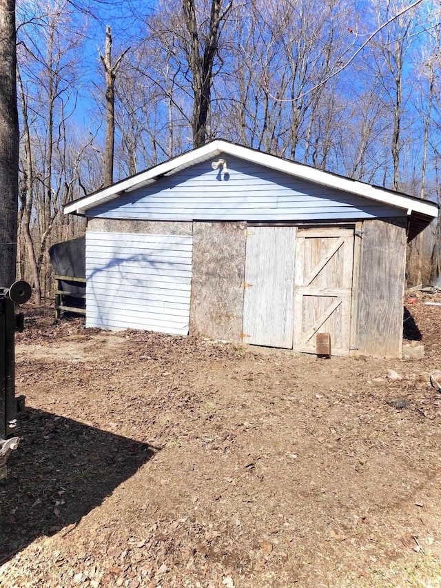 view of outbuilding featuring an outdoor structure