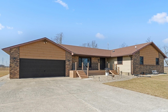 ranch-style house with an attached garage, covered porch, concrete driveway, a front lawn, and brick siding