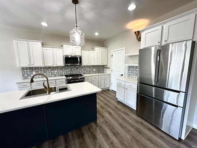 kitchen featuring backsplash, open shelves, dark wood finished floors, stainless steel appliances, and a sink