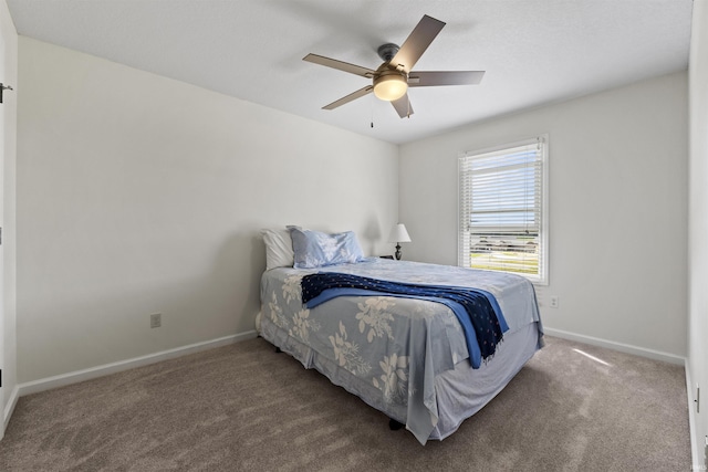 bedroom featuring carpet, baseboards, and ceiling fan