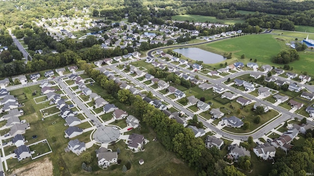 birds eye view of property featuring a residential view and a water view