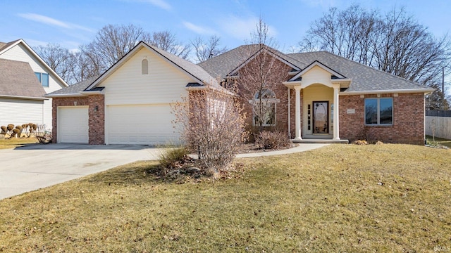 ranch-style home with brick siding, concrete driveway, roof with shingles, a front yard, and a garage