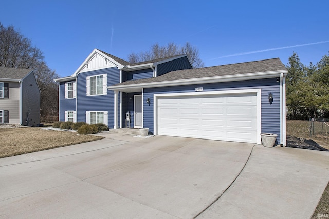 tri-level home featuring driveway, a shingled roof, a garage, and board and batten siding