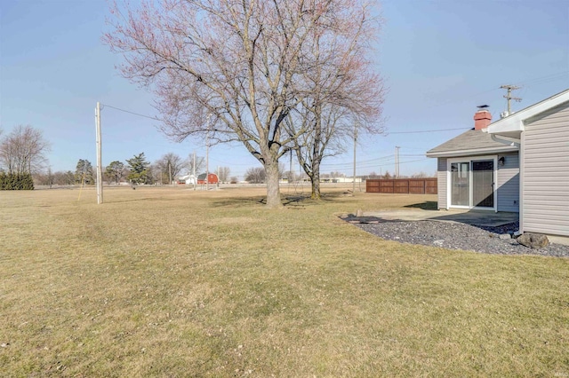 view of yard featuring fence