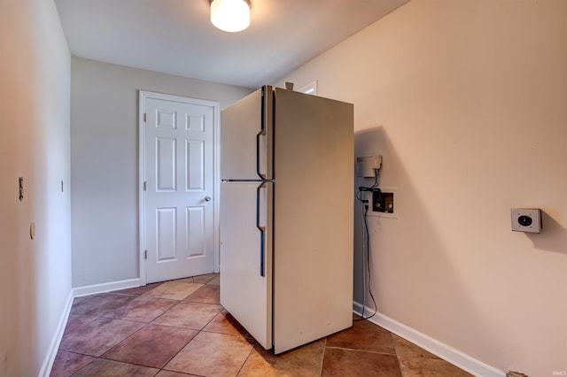 washroom featuring laundry area, hookup for a washing machine, baseboards, and electric dryer hookup