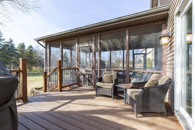 deck featuring a sunroom