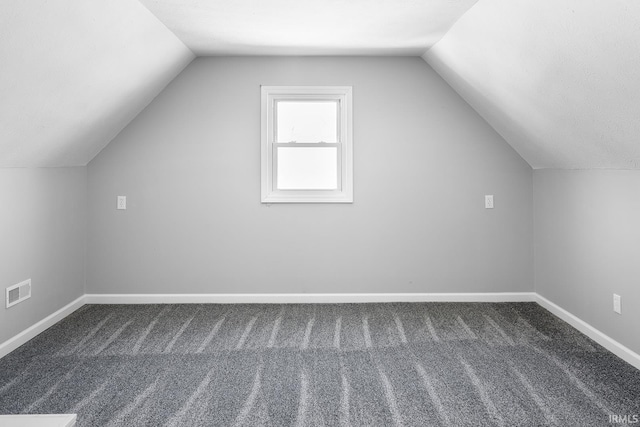 bonus room featuring visible vents, baseboards, and carpet floors