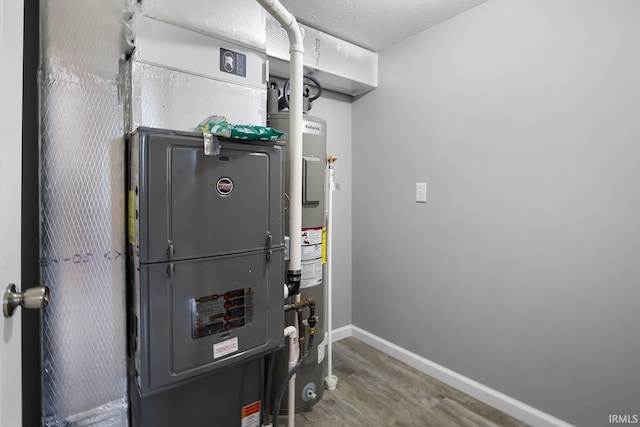 utility room with electric water heater