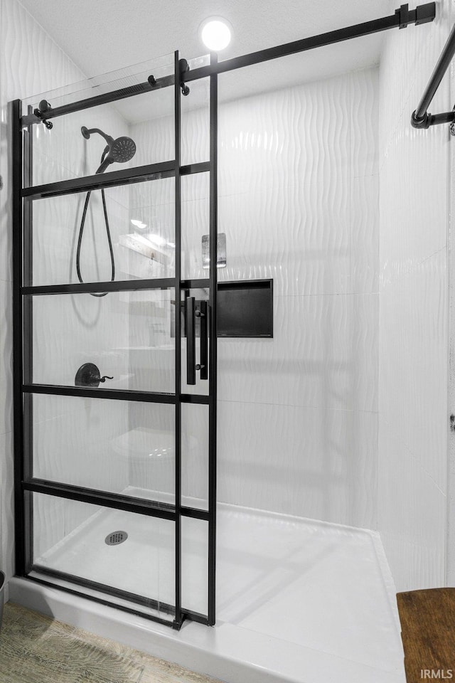 interior space featuring a shower stall