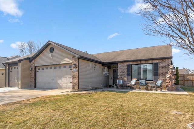 single story home with fence, an attached garage, concrete driveway, a front lawn, and brick siding