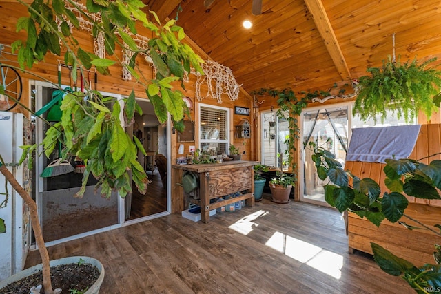 exterior space featuring wooden ceiling and vaulted ceiling with beams