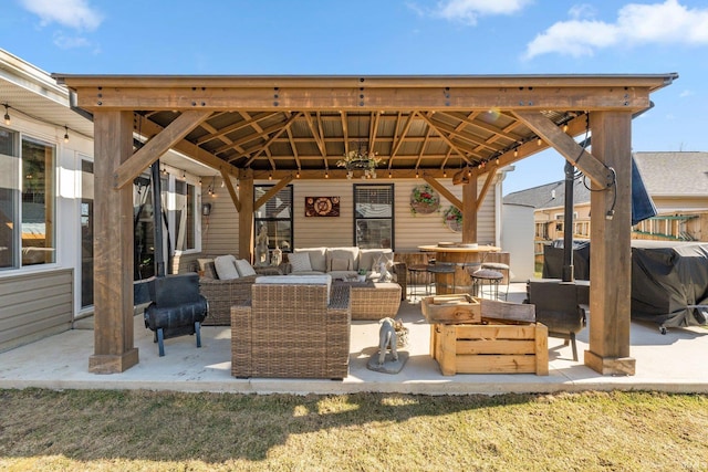 view of patio / terrace with a gazebo and an outdoor hangout area