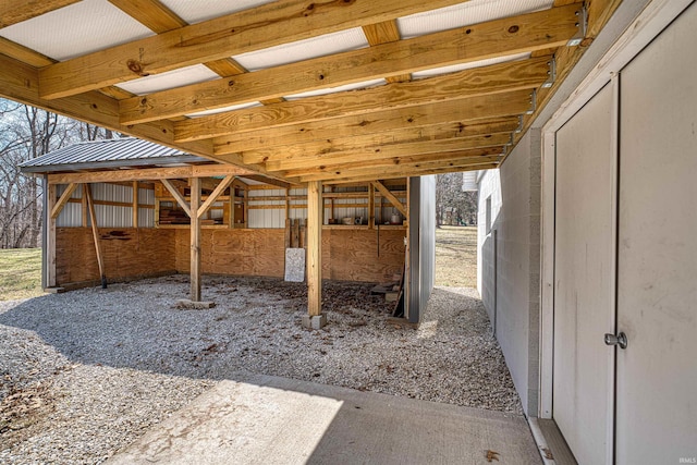 view of patio with an exterior structure and an outdoor structure