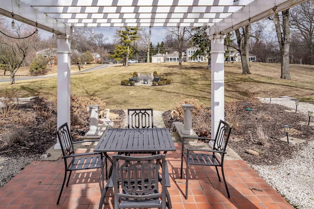 view of patio / terrace featuring a pergola and outdoor dining area