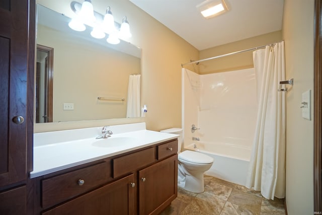 bathroom with toilet, shower / bath combo, and vanity