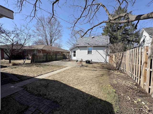 view of yard with a fenced backyard