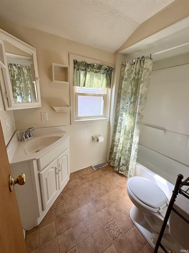 full bath with toilet, vanity, lofted ceiling, shower / tub combo, and a textured ceiling