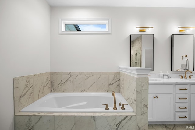 full bath featuring a marble finish shower, double vanity, a sink, a garden tub, and marble finish floor