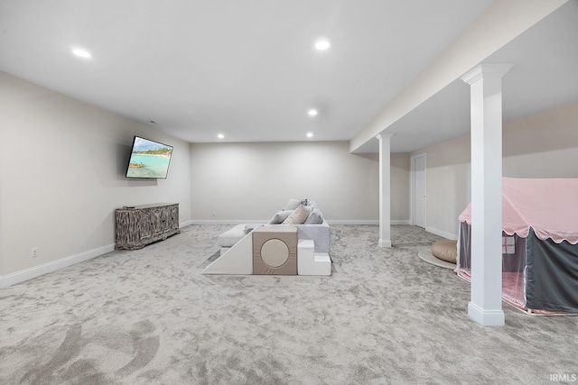 living area featuring recessed lighting, baseboards, and carpet floors