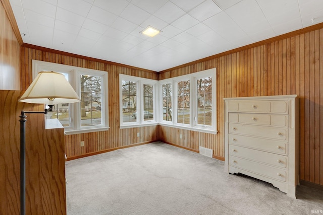 unfurnished sunroom featuring visible vents