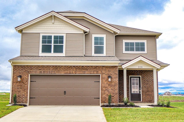 view of front facade featuring brick siding, driveway, a front lawn, and a garage