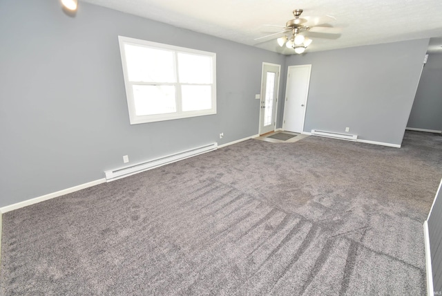 empty room featuring ceiling fan, a baseboard heating unit, baseboards, and carpet floors