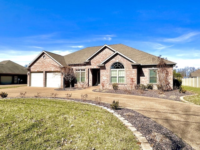 ranch-style home with fence, driveway, roof with shingles, an attached garage, and brick siding