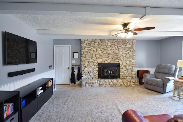 living room with light carpet, light tile patterned floors, a textured ceiling, and ceiling fan