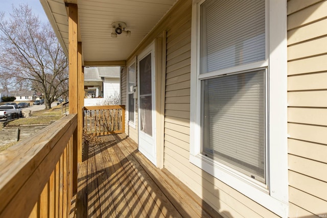 wooden deck featuring covered porch