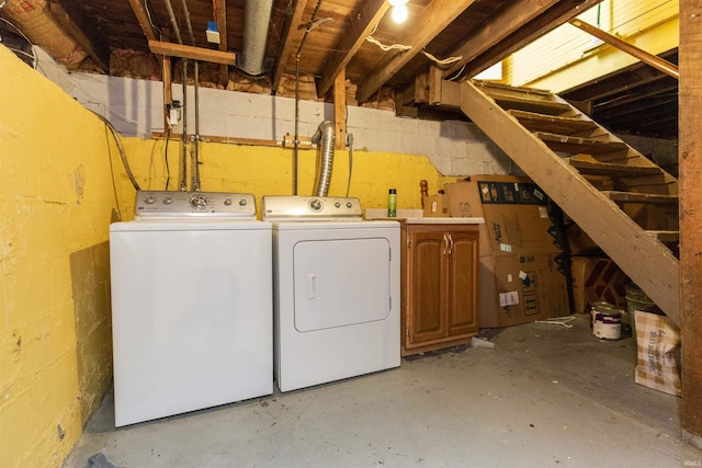 laundry area with cabinet space and washing machine and dryer