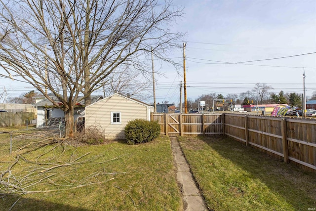 view of yard featuring a gate and fence