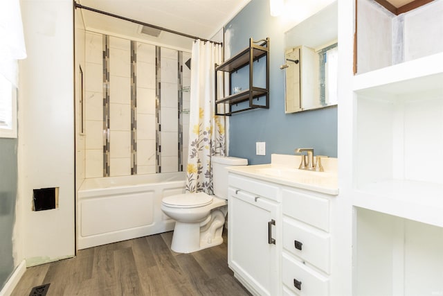 bathroom featuring visible vents, toilet, wood finished floors, shower / bath combination with curtain, and vanity