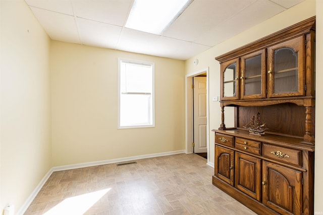 interior space featuring visible vents and baseboards