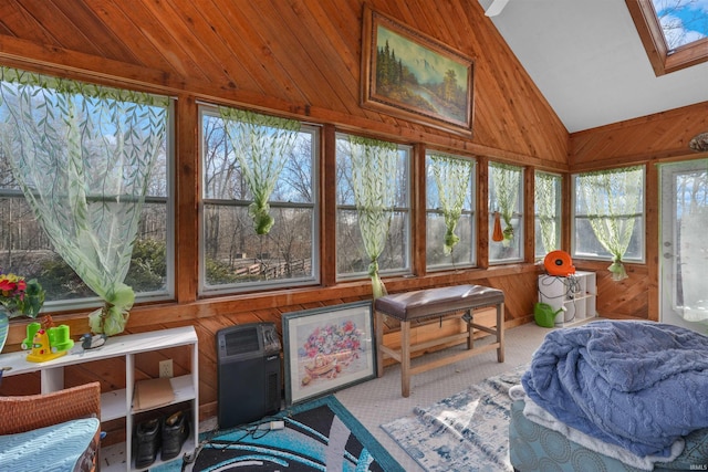 sunroom / solarium with lofted ceiling with skylight and wood ceiling