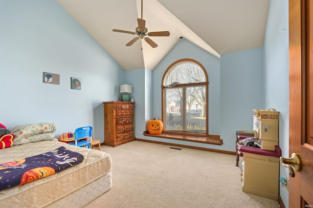 bedroom featuring baseboards, a ceiling fan, carpet, and vaulted ceiling