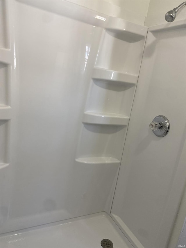 full bath featuring a stall shower