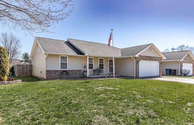 ranch-style house featuring a porch, fence, a front yard, a garage, and brick siding