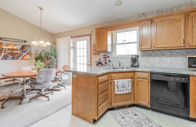 kitchen with a sink, backsplash, black dishwasher, light countertops, and lofted ceiling