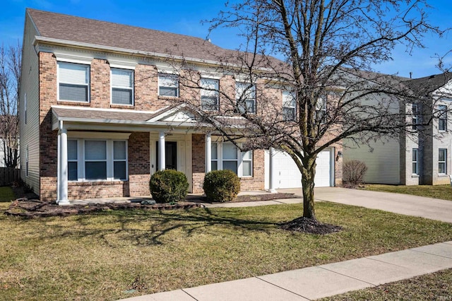 view of property with a front yard, an attached garage, a shingled roof, concrete driveway, and brick siding