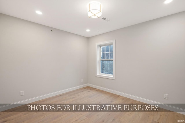 620 N Notre Dame Ave, South Bend, IN 46617 - spare room with wood finished floors and recessed lighting