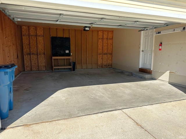 garage featuring a garage door opener