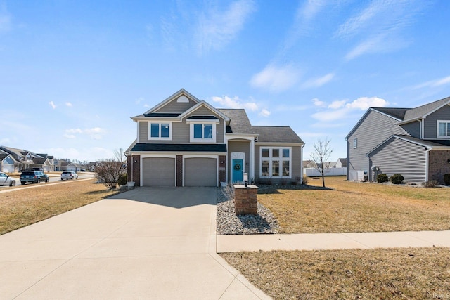 traditional home with a residential view, a front lawn, concrete driveway, a garage, and brick siding