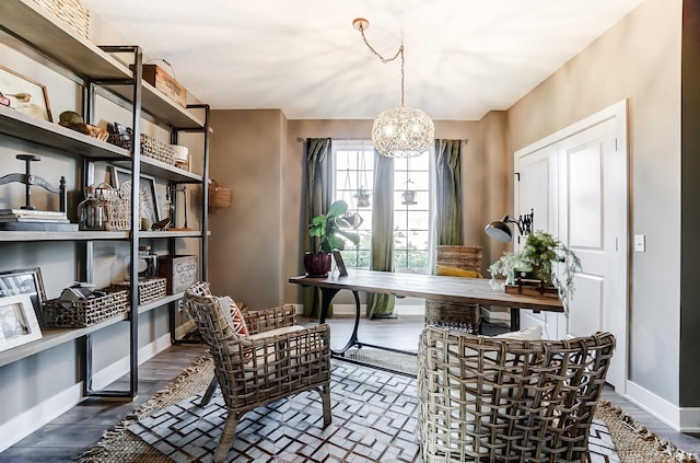 office with wood finished floors, baseboards, and a chandelier