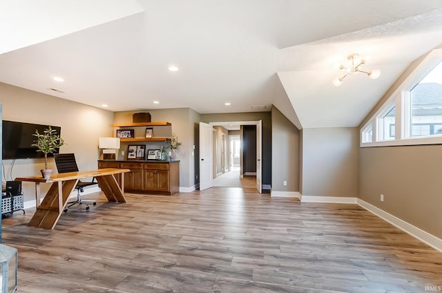 home office featuring light wood finished floors, a chandelier, recessed lighting, and baseboards